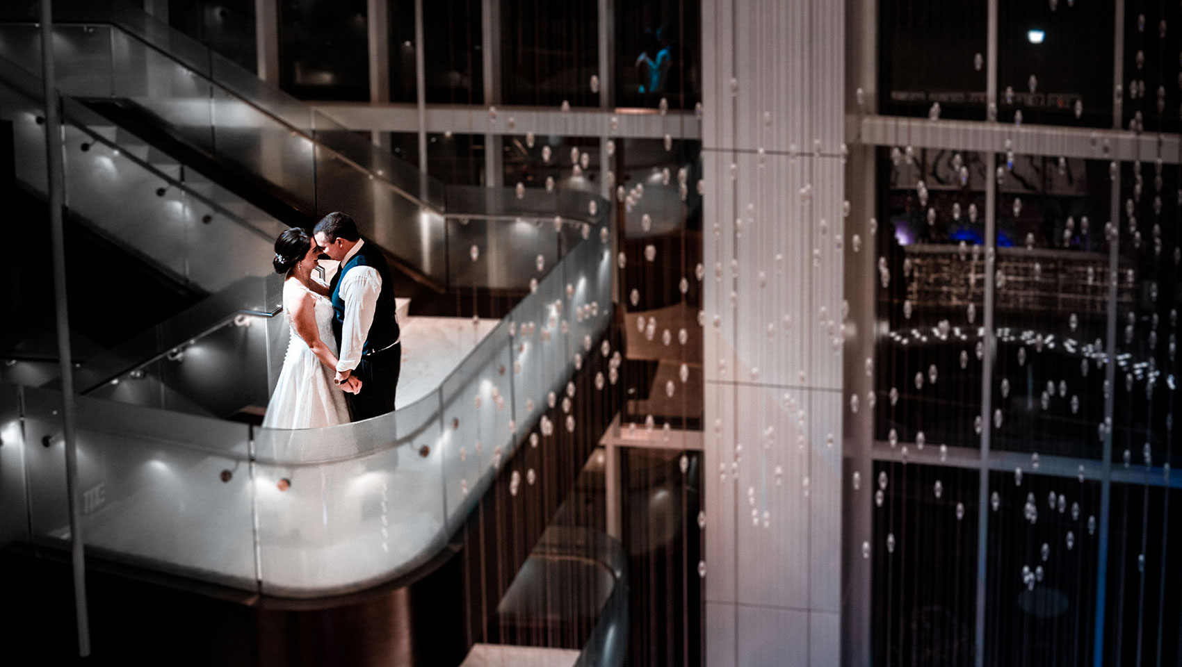 Bride and Groom on Lobby Staircase