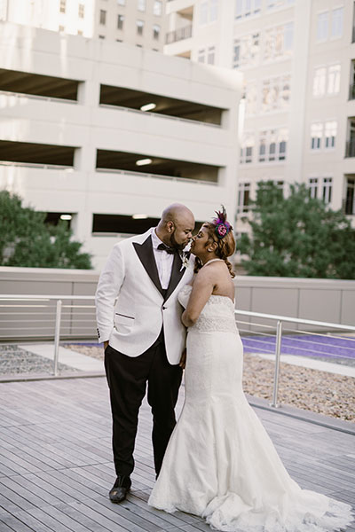 Newlyweds on Tryon Park rooftop